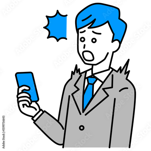 スマートフォンの画面を見て驚くスーツの男性