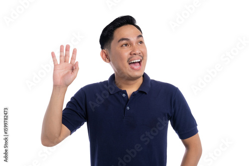 Cheerful man waving hand and smiling while looking up wearing navy blue polo shirt isolated on transparent background