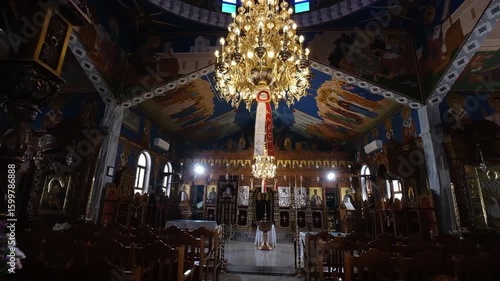 Incredible view of the old interior ceiling decorated with religious Orthodox church painting. Ready to vaftisi, A Cinematic indoor/inside View of greek cypriot orthodox church in cyprus 