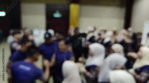 Wallpaper Mural A group of people having fun in a team building game. Soft focus video Torontodigital.ca