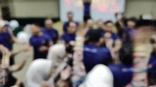 Wallpaper Mural A group of people having fun in a team building game. Soft focus video Torontodigital.ca