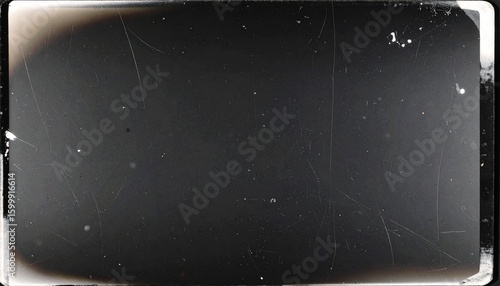 Vintage film frame with scratches and dust. Retro screen overlay texture for an old movie effect. Grunge cinematic background.