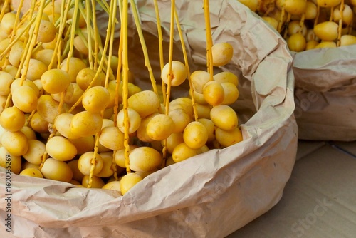 Fresh yellow dates look so delicious.