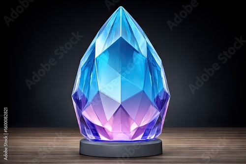 A faceted, teardrop-shaped gemstone, iridescent blue and pink, sits on a dark wooden surface