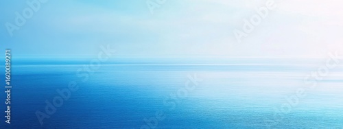 Smooth blue gradient of the ocean meeting the sky, creating a calm, serene, and visually peaceful seascape.