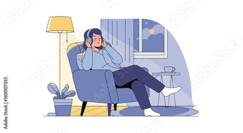 Woman relaxing in a chair listening to music on headphones at home