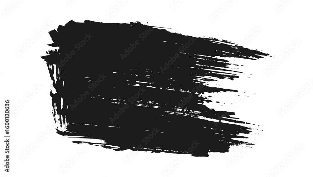 Fototapeta premium A bold black brush stroke creates a textured abstract shape with rough edges on a clean white background