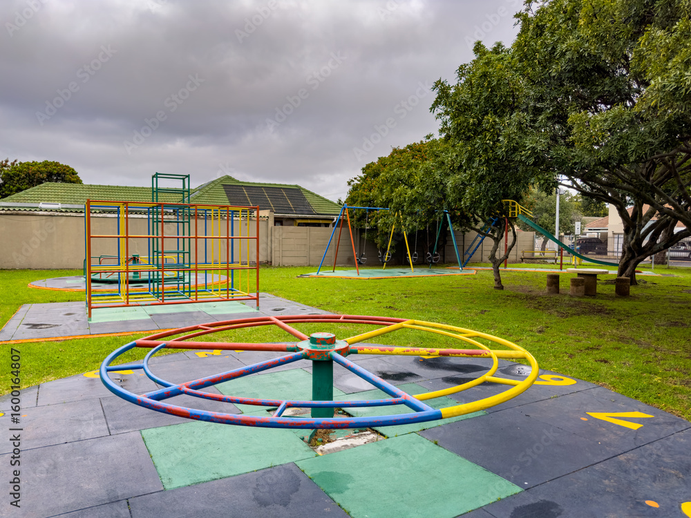 Obraz premium Public children's playground park on a cloudy day