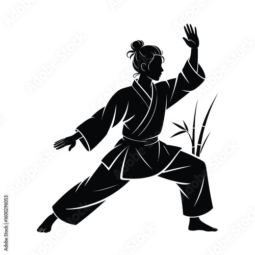 Silhouette of a person practicing martial arts in traditional clothing