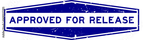 Grunge blue approved for release word hexagon seal stamp on white background