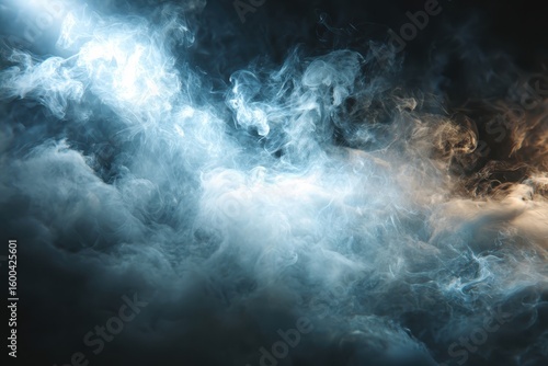 Swirling vapor, illuminated in ethereal blues and golds against darkness. Use this moody smoke effect for creative compositing and backgrounds.
