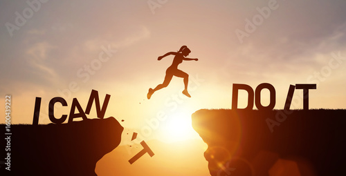 Photos Silhouette of woman jump across cliff with word I CAN DO IT