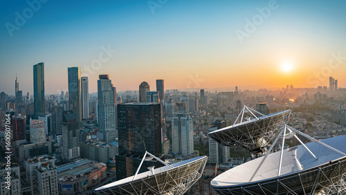 Tableau sur toile Ground satellite base stations and thriving city downtown areas