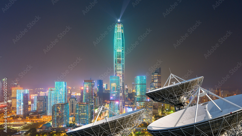 Obraz premium Ground satellite base stations and thriving city downtown areas
