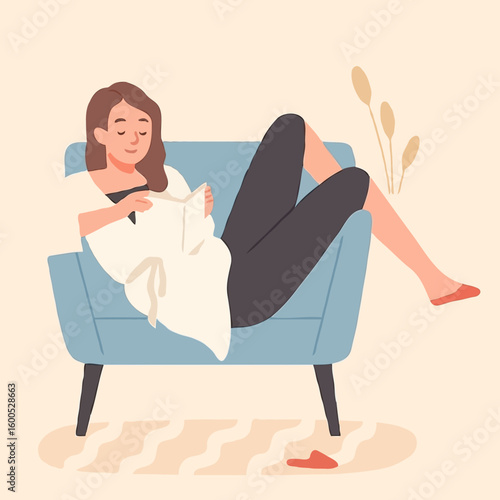 Woman relaxing while knitting on a blue armchair in a cozy setting  