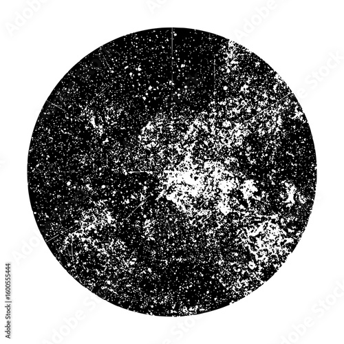 Monochrome circle filled with a speckled texture of black and white spots and scattered lines design