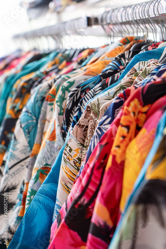Wallpaper Mural Colorful tropical shirts on clothing rack Torontodigital.ca