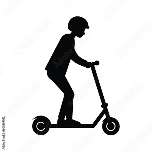 Silhouette of a person riding a push scooter
