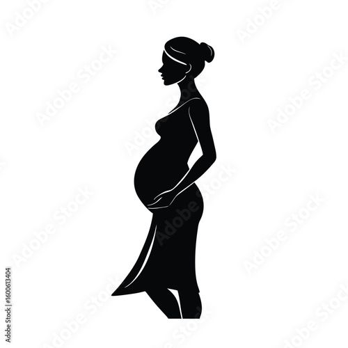 Silhouette of a pregnant woman standing