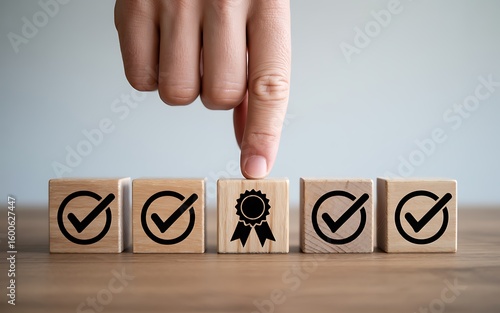 Hand selecting wooden blocks with checkmarks and award symbol finger choosing