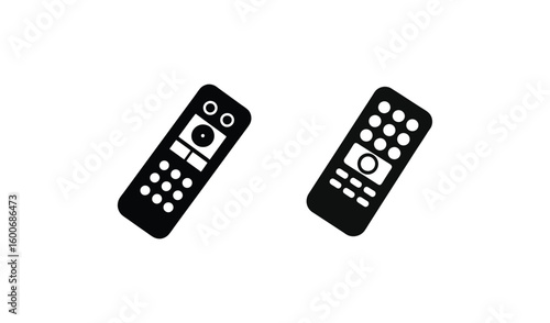 Two black remote controls on a white background