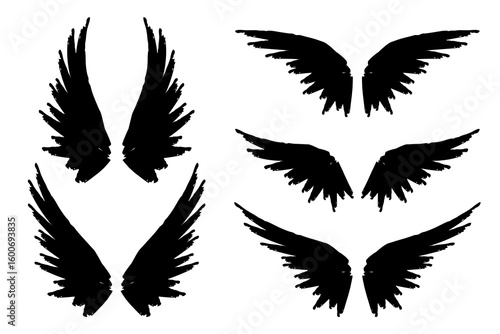 set of black raven or crow wings. Vector illustration.