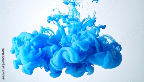 Vibrant blue ink dispersing in air