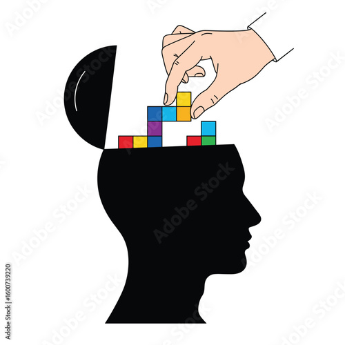 Building cognitive abilities with a hand placing colorful blocks into an open head