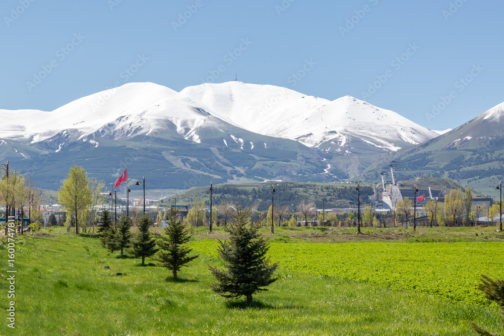 Fototapeta premium Spring in Erzurum with snowy mountains