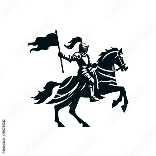Silhouette of a medieval knight in full armor riding a rearing horse holding a flowing flag