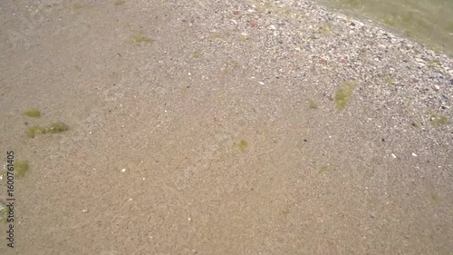 Waves from the shore of Pogradec beach in Albania. - June 12, 2025
