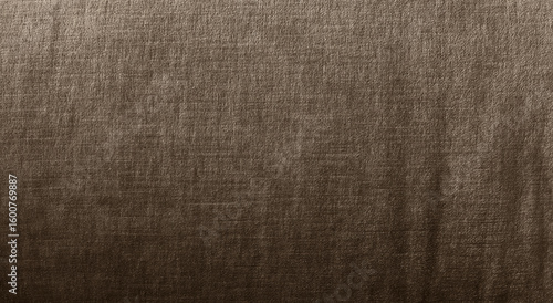 Brown fabric texture background with subtle sheen. Elegant textile surface for design, fashion, upholstery, or abstract backdrop. High-quality natural fibers. close up fabric texture.