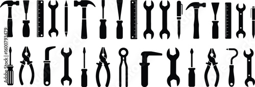 Collection of black tool silhouettes including hammers wrenches screwdrivers and pliers