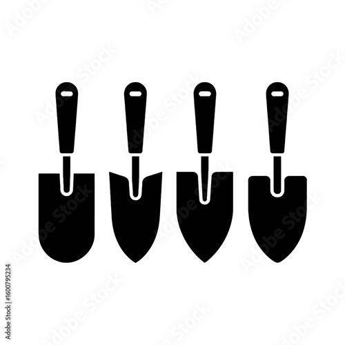 Set of four black garden trowels isolated on white background