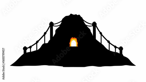 Silhouette of a mountain with a bridge and a fiery entrance in the middle of the mountain side view