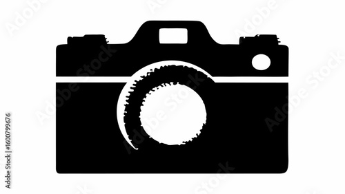 A black and white silhouette of a camera with a lens and a flash and a top handle and a rectangular body