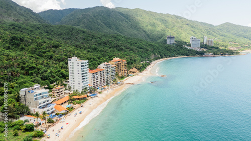 Tableau sur toile Puerto vallarta beachfront hotels nestled between lush tropical rainforest and t