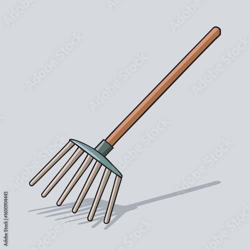 A garden rake with a wooden handle and metal tines is shown isolated on a white background, casting a subtle shadow.