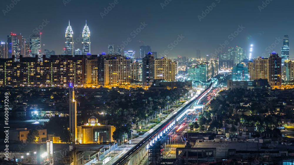 Fototapeta premium Jumeirah Palm island skyline night timelapse in Dubai, UAE.