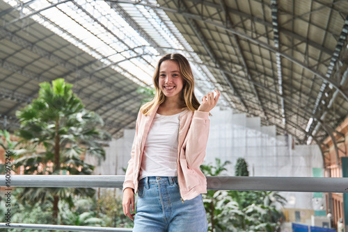 Young woman smiling in atocha train station,