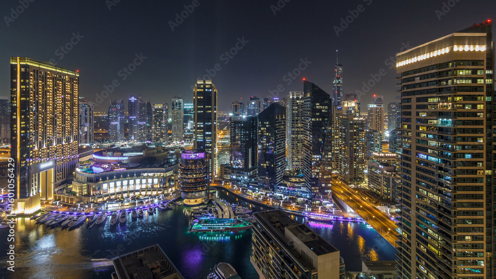 Night illumination of Dubai Marina aerial timelapse, UAE. Night illumination of Dubai Marina aerial timelapse, UAE.
