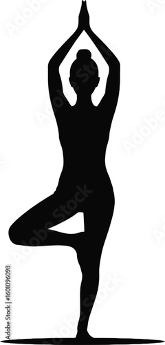Graceful woman performing yoga tree pose in a striking black silhouette