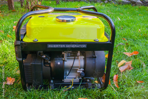 Yellow Inverter on Grass: Compact Power