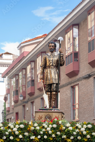 Image of Saint Isidore the Farmer in procession on a street in Madrid, Spain
