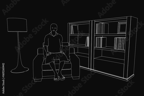 A man sits on a couch in a dimly lit room, his contour highlighted by a warm lamp. Bookshelves filled with books surround him, creating a cozy atmosphere.