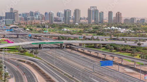 Canvas Print Dubai Golf Course with a cityscape of Greens and tecom districts at the backgrou