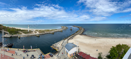 Fototapeta Naklejka Na Ścianę i Meble -  The entrance to the port of Kolobrzeg on the Baltic Sea in Poland, seen from above from the old lighthouse