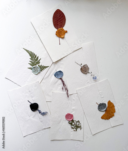 envelope with wax seal and flowers