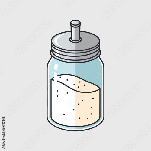 Sugar in a glass jar with a metal lid on a light background.