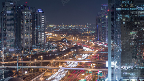 Photography Dubai Marina and JLT aerial night timelapse top view of skyscrapers in Dubai, UAE